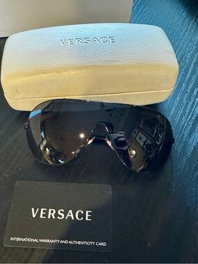 Versace sunglasses with original bill of sale, box, & authentication card.